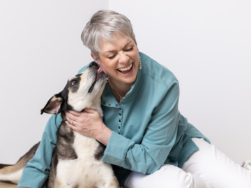 Photo of Kristan Higgins with her dog