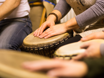 Group drumming for wellness